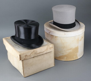 Herbert Johnson, a silk top hat with felt band (slight dent to top of hat) together with a Herbert Johnson grey top hat, both size size 7 1/8th