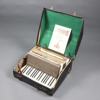 A Hohner Verdi II accordion numbered 214217 with 80 buttons, with certificate and cased 