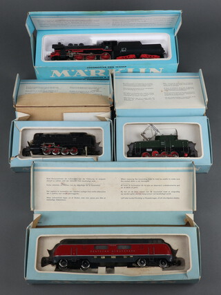 A Marklin locomotive and tender 3098, an electric shunting locomotive no. 3001, a diesel locomotive 3021 and a tank engine tender 3031 