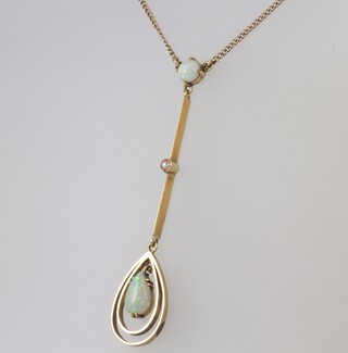 A yellow metal 15ct chain 40cm with a yellow metal opal set pendant, 4 grams  