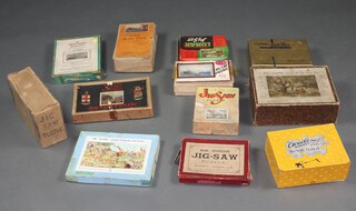 A collection of late 19th and early 20th Century jigsaws to include Academy Game of Wisdom no.806, Victory Gold Box Clovelly Donkeys, The Britannic Zig Zag puzzle, GWR Royal Route to The West, Bon Marche jigsaw, Chad Valley, Lunar etc 