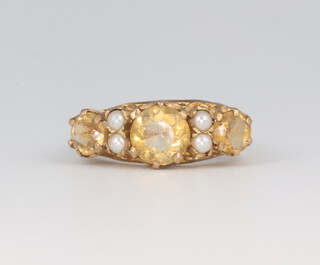 A 9ct yellow gold citrine and seed pearl ring, 3.1 grams, size L 1/2