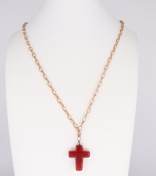 A yellow metal 9ct necklace 60cm, 3.3 grams gross with a glass cross pendant 