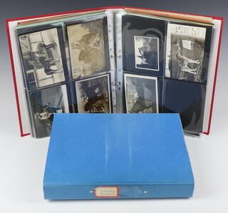 A ring bound album of various postcard photographs including carriages, horses, a blue ring bound album of postcard photographs of rural life  