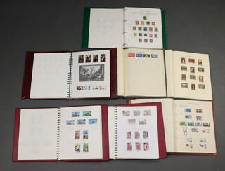 An album of mint and used Canadian stamps 1867-1981, Stanley Gibbons album of mint Isle of Man stamps and ditto mint and used Channel Island stamps, album of mint Jersey stamps and 3 albums of GB and Commonwealth stamps 