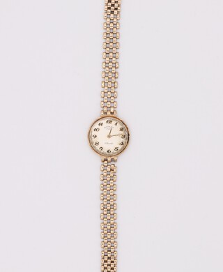 A lady's 9ct yellow gold Rotary wristwatch on a ditto bracelet, gross weight 14 grams 