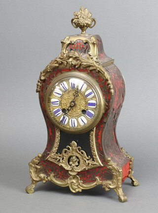 A 19th Century French red boulle clock case with 10cm gilt and porcelain dial with Roman numerals, containing a quartz movement 35cm x 19cm x 11cm 