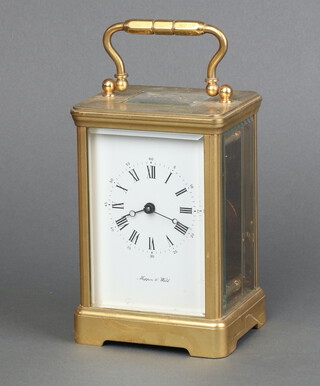 Mappin & Webb, a 20th Century carriage timepiece with enamelled dial Roman numerals contained in a gilt metal case 13cm h x 9cm x 8cm, complete with key 