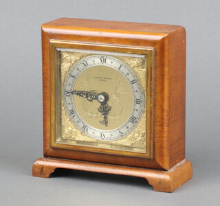 Elliott for Mappin & Webb, a 1950's timepiece with gilt dial, silvered chapter ring and Roman numerals, contained in a walnut case 14cm x 12cm x 5cm 