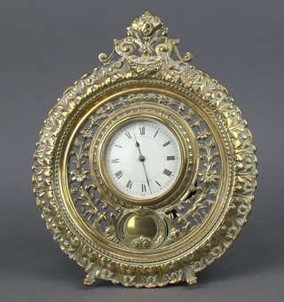 A Victorian timepiece with enamelled dial and Arabic numerals contained in a pierced gilt metal circular easel frame 30cm diam. 