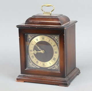 Smiths, a 1950's bracket clock with gilt dial and silvered chapter ring, contained in a mahogany case 20cm h x 19cm w x 15cm d, complete with key 