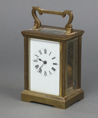 A 19th Century French 8 day carriage timepiece with 5.5cm dial contained in a gilt metal case 11cm x 8cm x 6cm 