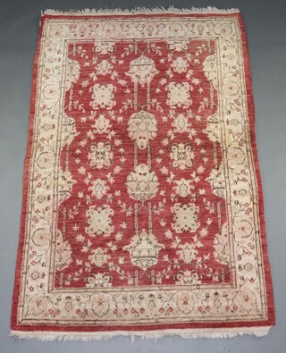 A brown and white ground Caucasian style floral patterned rug 184cm x 122cm 