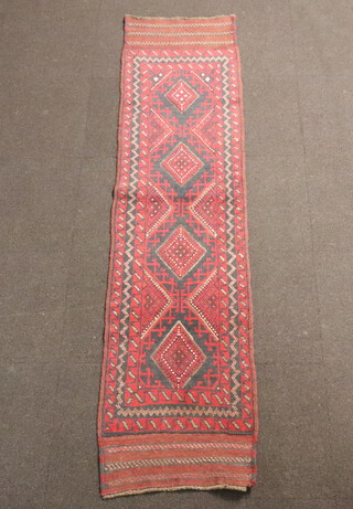 A black and red ground Meshwani runner with 4 diamonds to the centre within a multi row border 237cm x 57cm 