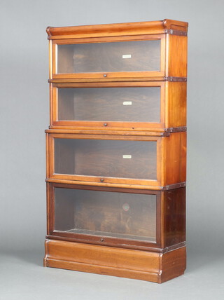A Globe Wernicke 4 tier mahogany bookcase enclosed by glazed panelled doors 152cm h x 87cm w x 26cm d 