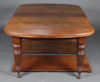 A Victorian mahogany oval extending dining table with 2 extra leaves, raised on turned and fluted supports, complete with winder 75cm h x 78cm w x 121 l x 275cm l when fully extended 