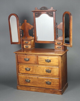 A Victorian mahogany dressing chest with triple plate mirror fitted 4 glove drawers above 2 short and 3 long drawers 
