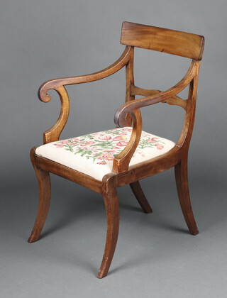 A 19th Century bleached mahogany bar back carver chair with Berlin woodwork drop in seat, raised on sabre supports 85cm h x 53cm w x 47cm d (seat 25cm x 35cm)