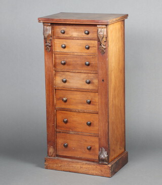 A Victorian bleached mahogany Wellington chest of 7 drawers, raised on a platform base 108cm h x 52cm w x 37cm d 