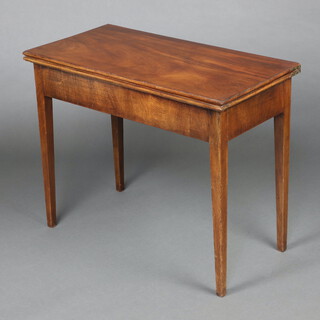 A 19th Century rectangular mahogany card table raised on square tapered supports 73cm h x 91cm w x 46cm 