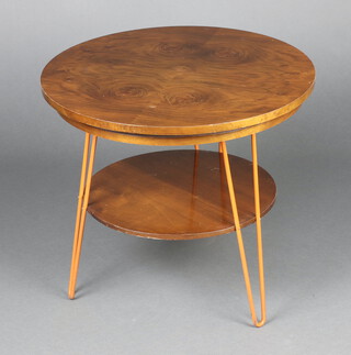 A 1950's walnut finished quarter veneered 2 tier occasional table with rotating top, raised on hairpin supports 55cm h x 62cm diam. 