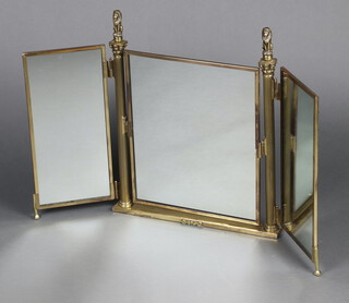 A 1950's gilt metal triple plate dressing table mirror with lion finials 55cm h x 55cm w 