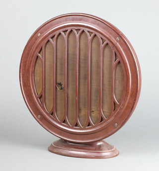 An Art Deco B B T H circular Bakelite radio speaker raised on an oval base 37cm (crack to side) 