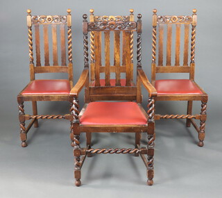 A set of 4 1930's  oak stick back dining chairs - 1 carver, 3 standard (1 is a/f)
