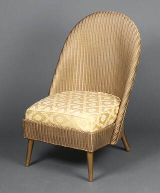 A Lloyd Loom gold painted nursing chair with paper label to base 76cm h x 46cm w x 46cm d 