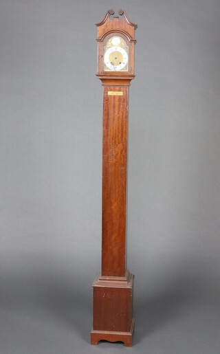 A 1920's miniature long case clock case, the 11cm arched gilt dial with silvered chapter ring, Roman numerals contained in a mahogany case 164cm h x 18cm w x 16cm d 