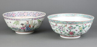 Two Chinese famille rose bowls decorated with flowers and landscapes 26cm 