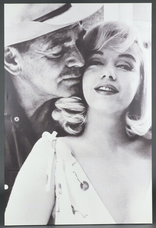 A black and white enlarged photographic poster of Marilyn Monroe and Clark Gable, a scene from the Misfits 184cm x 122cm   