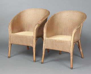 A pair of gold painted Lloyd Loom chairs 67cm h x 50cm w x 43cm d (1 with wear to front of seat) 