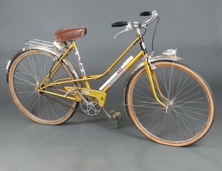 A lady's Moto Becane yellow painted bicycle 