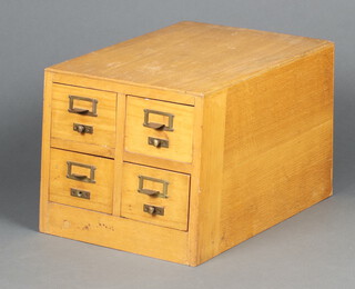 A Durrant 1950's light oak 4 drawer index filing chest 31cm h x 36cm w x 46cm d (contact marks in places)