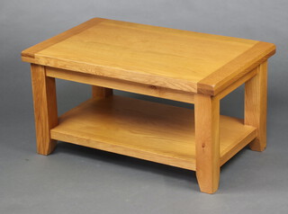 A rectangular light oak 2 tier coffee table 30cm h x 90cm w x 47cm d  