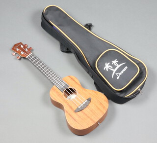 A Donner ukulele with fabric case
