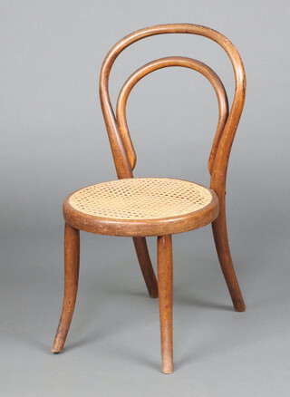A child's Thonet style bentwood chair with woven cane seat 65cm h (contact marks in places) 