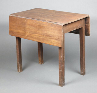 A pine drop flap table raised on square tapered supports 72cm h x 79cm w x 47cm d 