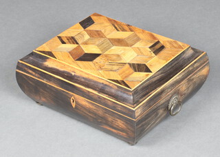 A 19th Century  rectangular coromandel cushion shaped trinket box, the lid with parquetry top and ring drop handles, 12cm x 28cm w x 22cm d 