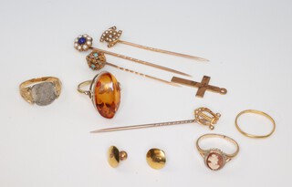 A yellow metal ring size K, 3 others - K, M and P, 3 tie pins and minor studs etc, gross weight 15.7 grams 
