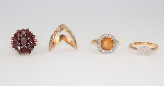 A yellow metal 18ct citrine cluster ring, size L, together with a garnet ditto size K 1/2, a gem set ring (lacking 1 stone) size M and a wishbone ring size K, gross weight 12.4 grams 