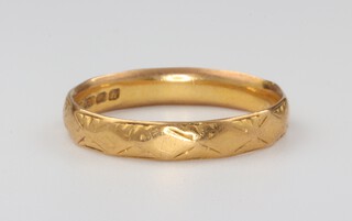 A 22ct yellow gold wedding band, size M, 2.9 grams 