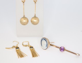 A pair of 9ct yellow gold earrings 6.1 grams, a pair of gold plated tassel earrings and a bar brooch set an amethyst 