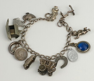 A silver charm bracelet, 41 grams 