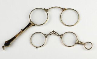 A pair of gilt and tortoiseshell lorgnette, a ditto gilt pair 