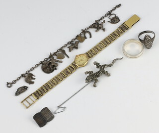 A silver charm bracelet and minor silver jewellery and a gilt watch 