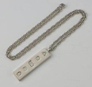 A silver ingot and chain 40 grams