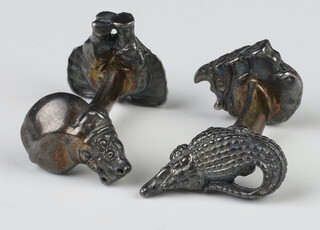 A pair of P Martick cast cufflinks decorated with African animals 19.3 grams 