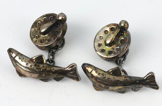 A pair of white metal 925 cufflinks in the form of fish in fishing reels, 15.6 grams 